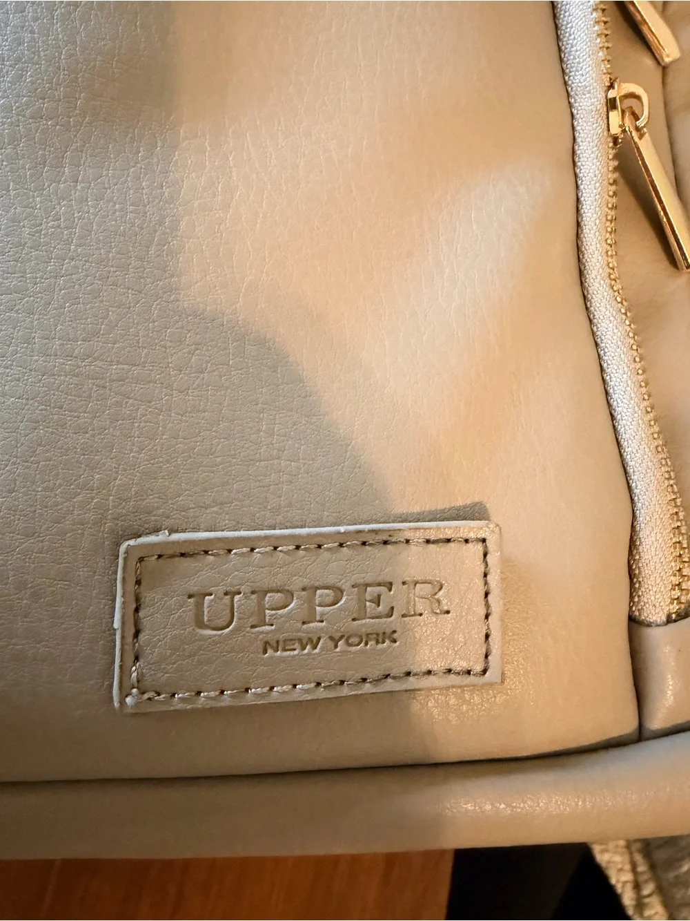 Stylish Cream Baby Bag Backpack with Gold Hardware